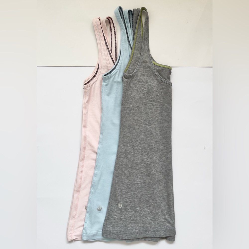 Lululemon Set of Three Sleeveless Tops in Gray, Blue, and Pink